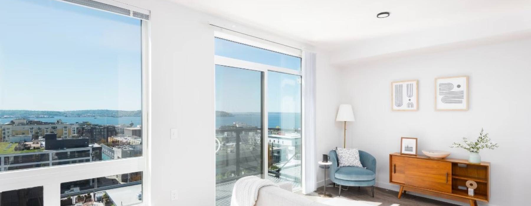 a living room with a couch, a chair and a table